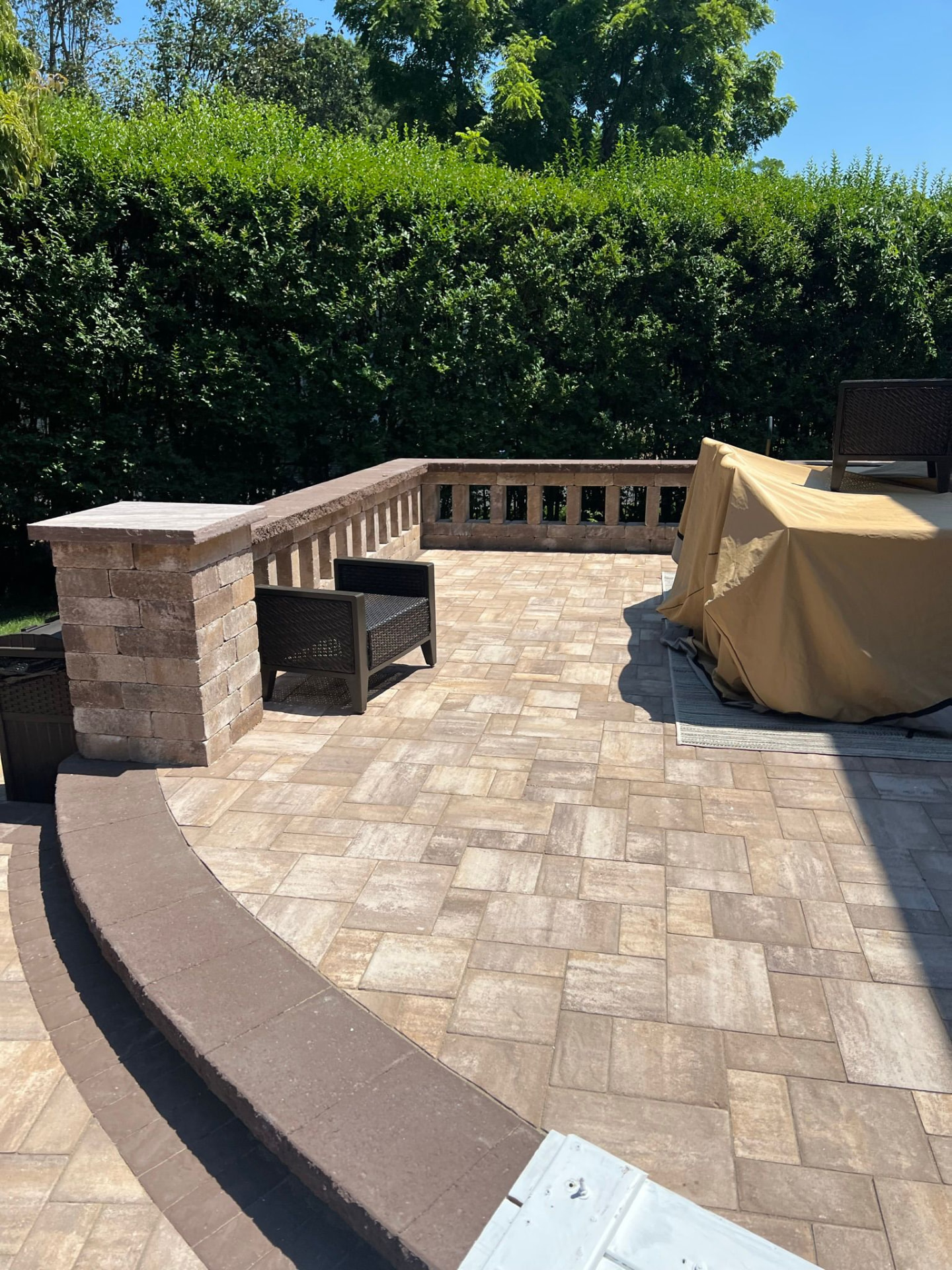 Tan paver patio with balustrade wall — Nesconset, NY