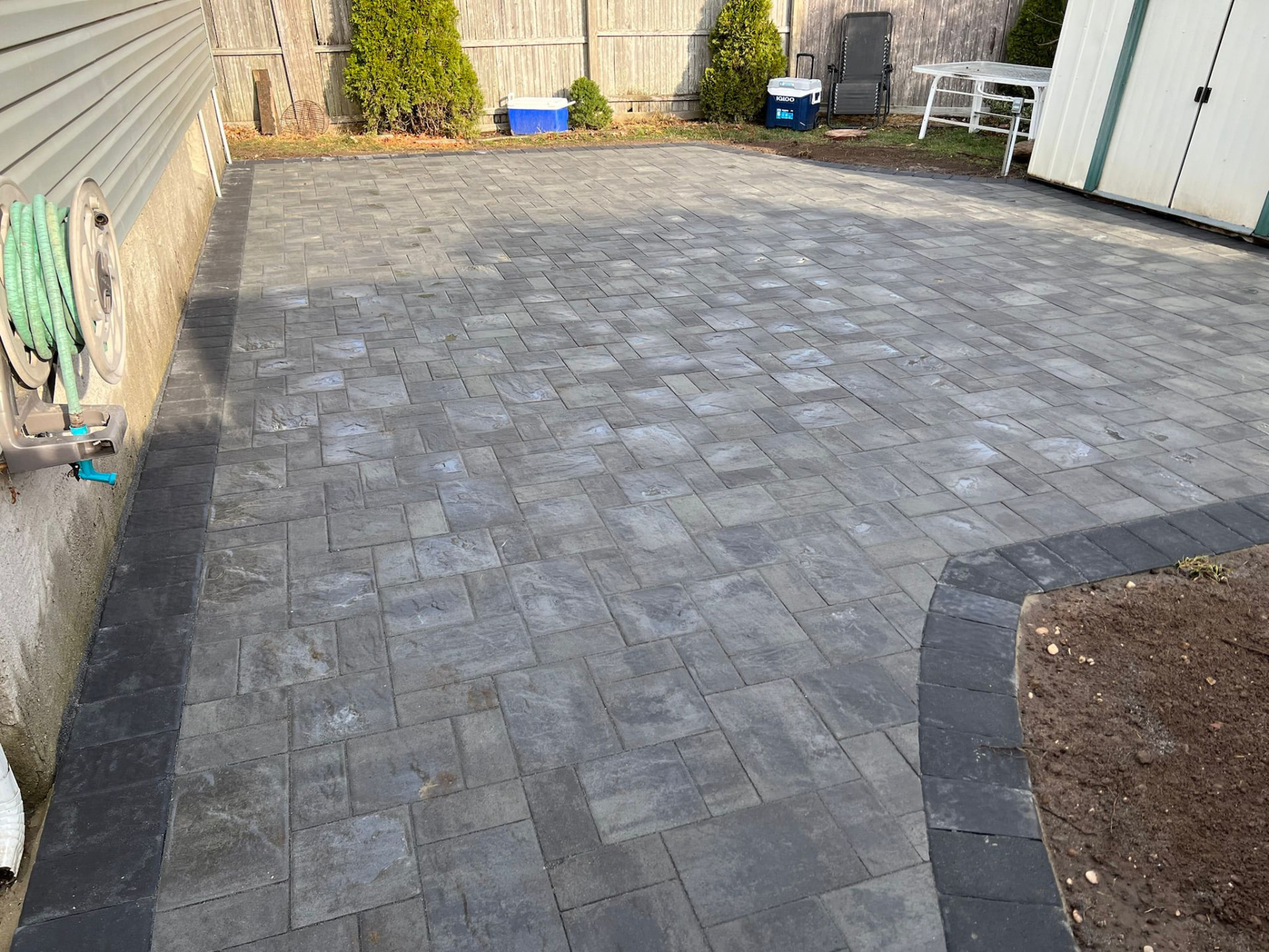 Rear yard paver patio, herringbone field — Sayville, NY