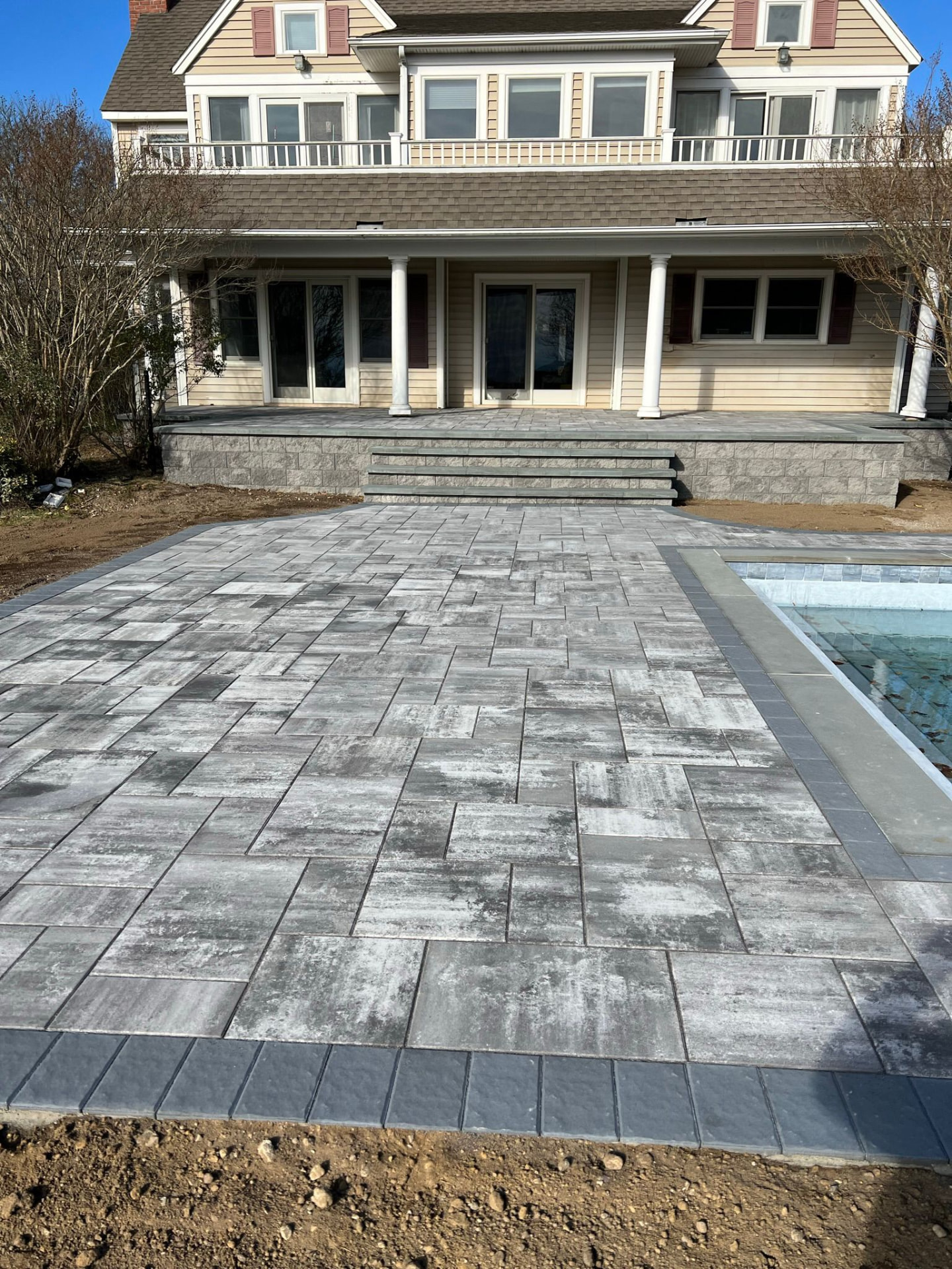 Grey paver patio & block stoop — Bay Shore, NY